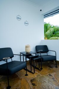 Sheltered balcony seating at Villa Buffalo Upstairs