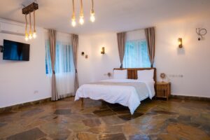 Spacious king-size bedroom at Villa Buffalo Upstairs