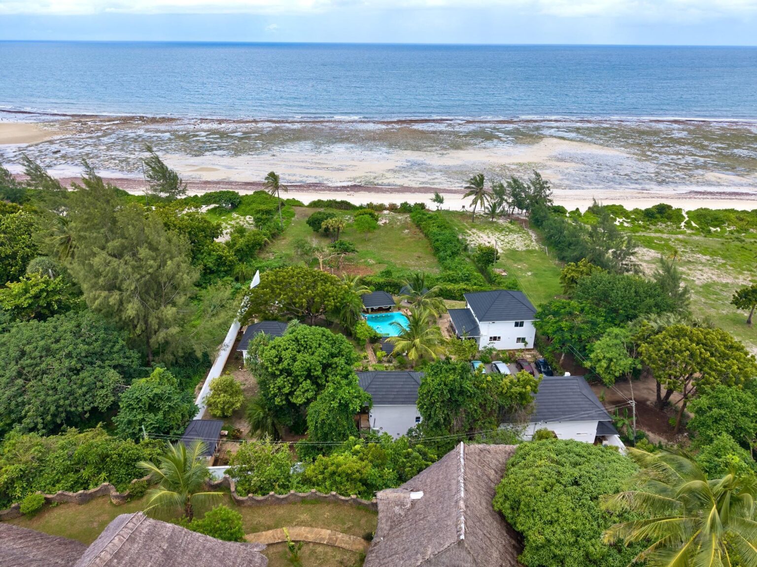 Aerial view of Coast Sun Gardens beside the Indian Ocean shoreline