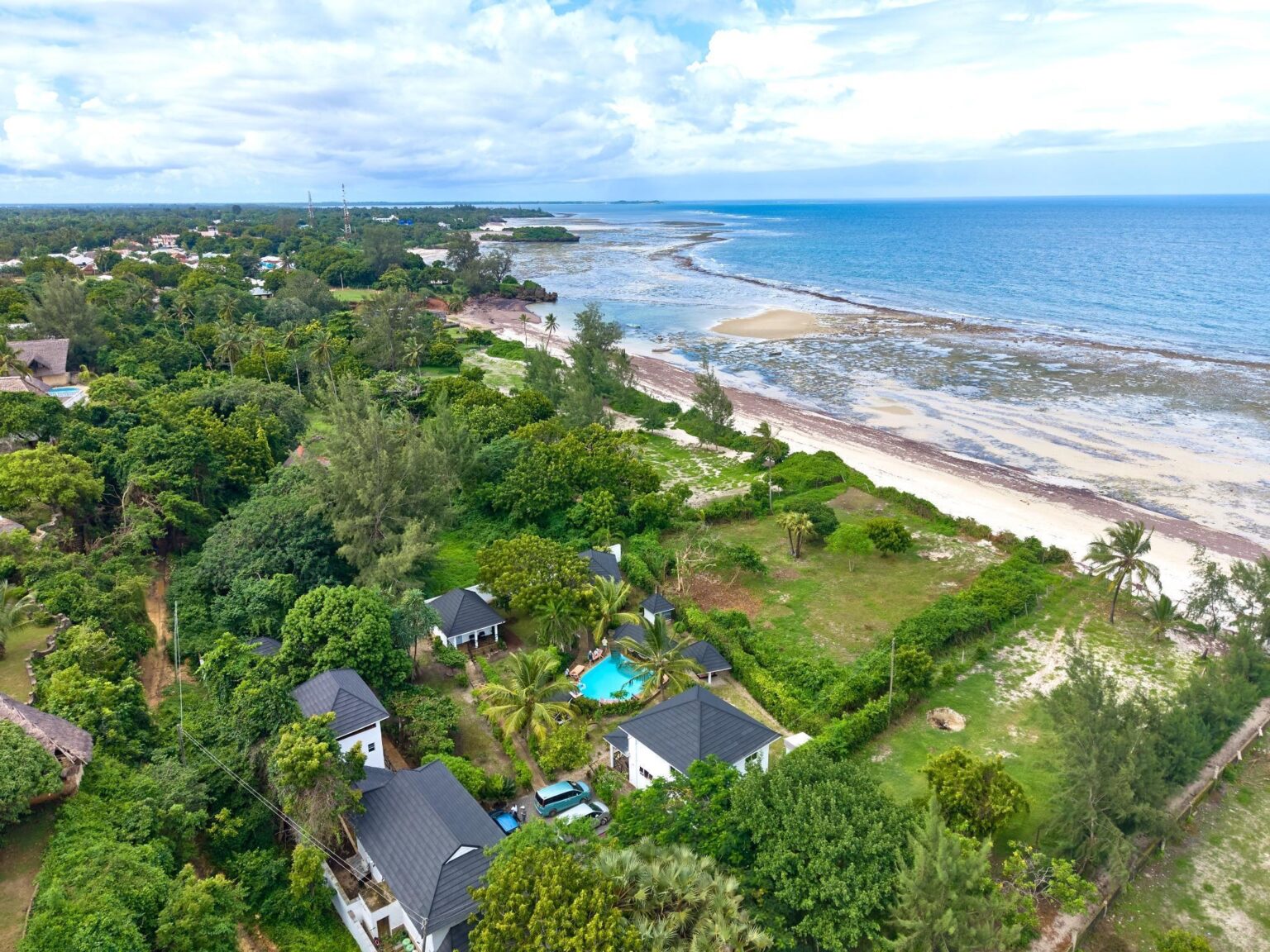 Aerial view along the Msambweni coastline with Coast Sun Gardens and pool