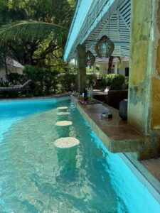 Submerged seats along the Coast Sun Gardens pool bar