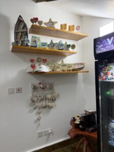 Handmade souvenirs displayed in the Coast Sun Gardens gift shop