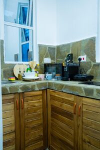 Compact wooden kitchenette at House Rhino