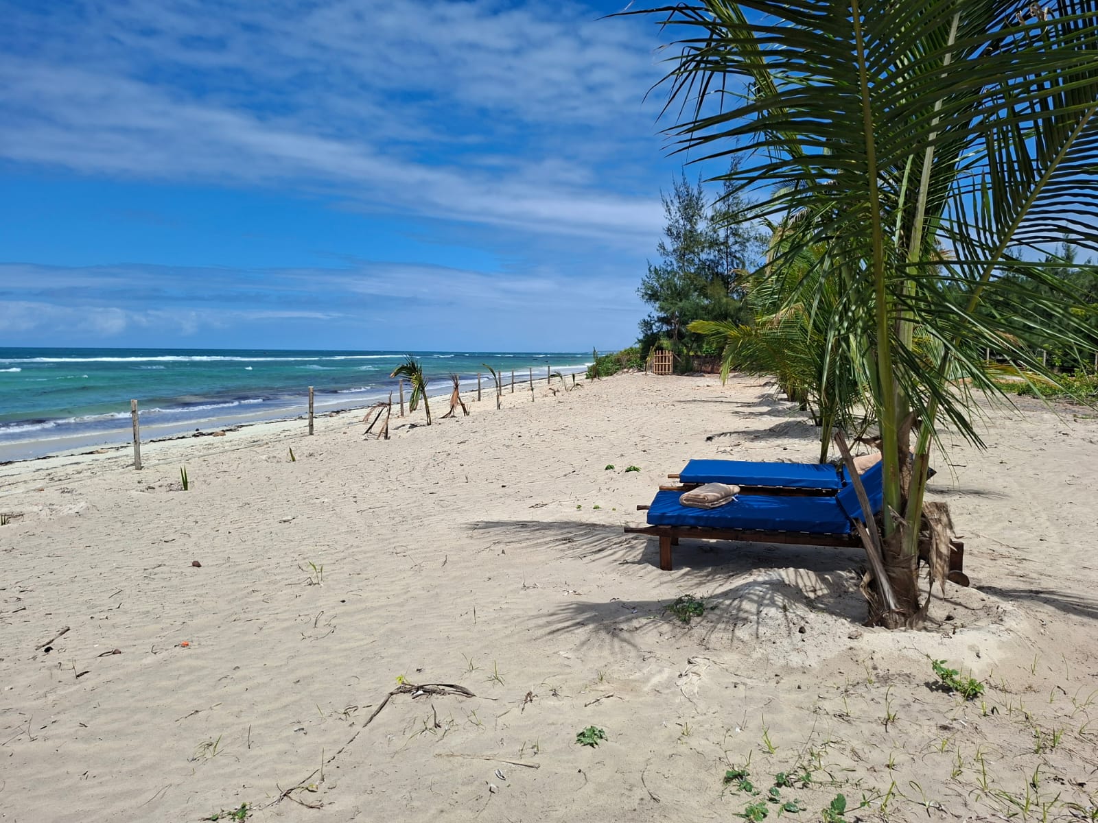 Quiet sandy private beach and Indian Ocean shoreline at Coast Sun Gardens